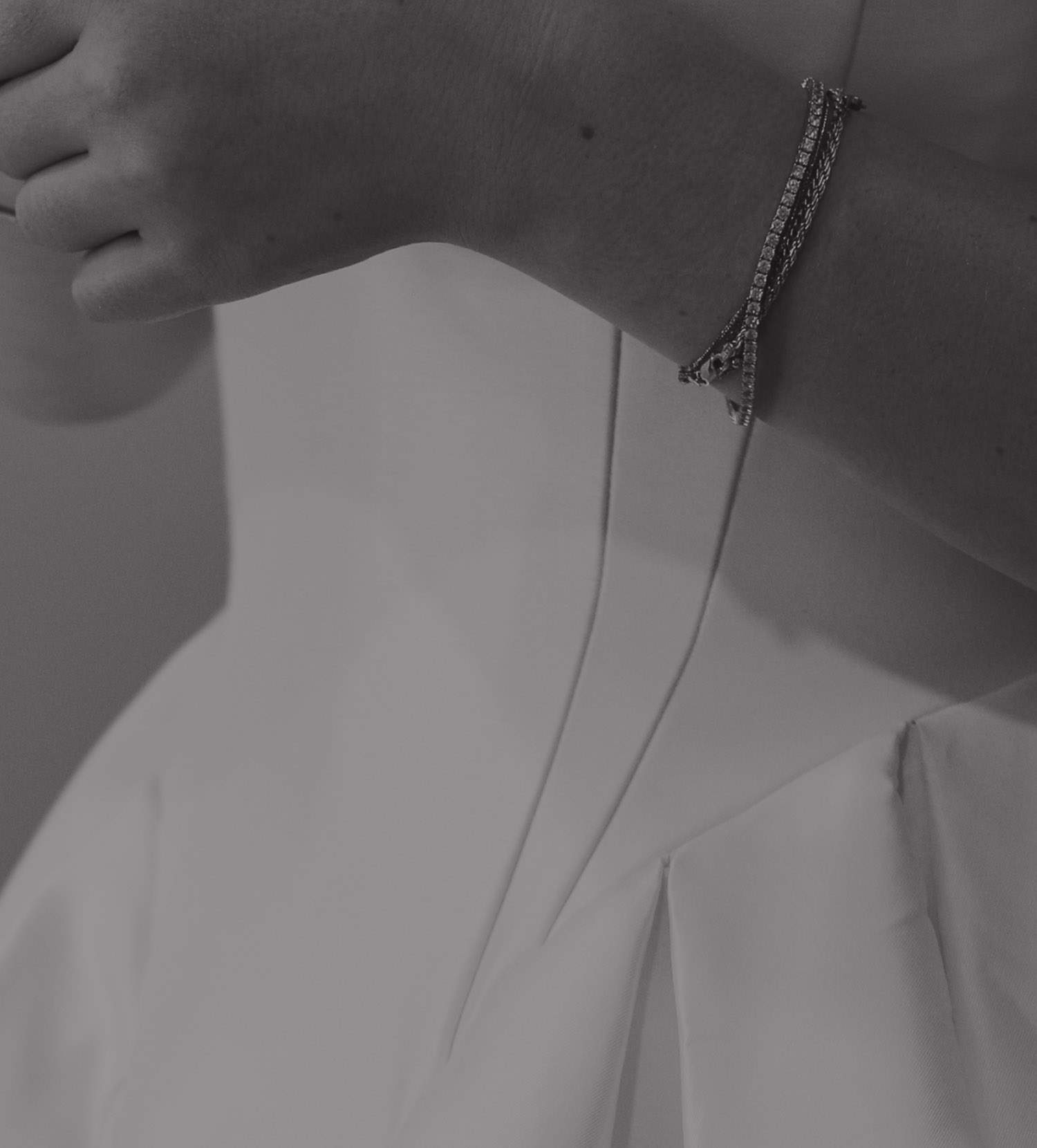 Photo of the model wearing a white gown - Mobile Image