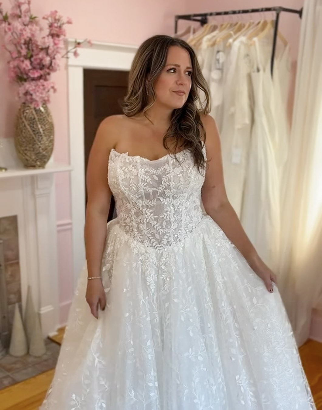 Photo of the model wearing a white bridal gown